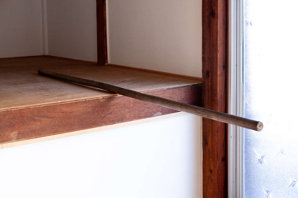 Stick 7 bronze 2019 Installation View wardrobe